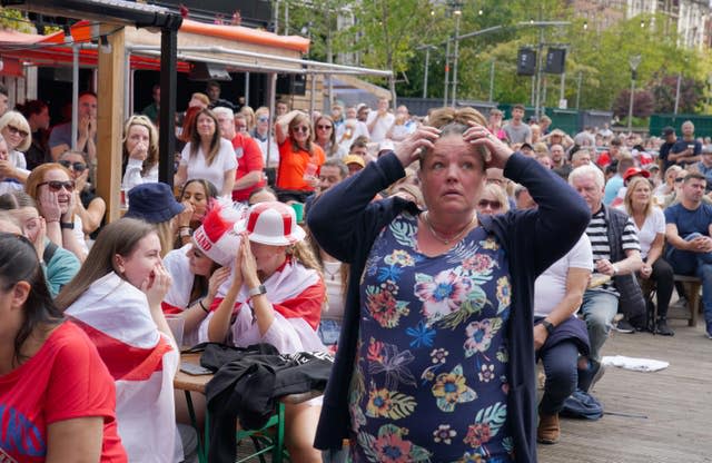 Fans watch Spain v England