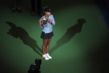 Sep 8, 2018; New York, NY, USA; Naomi Osaka of Japan poses with the championship trophy after defeating Serena Williams of the United States (not pictured) on day thirteen of the 2018 U.S. Open tennis tournament at USTA Billie Jean King National Tennis Center. Danielle Parhizkaran-USA TODAY Sports