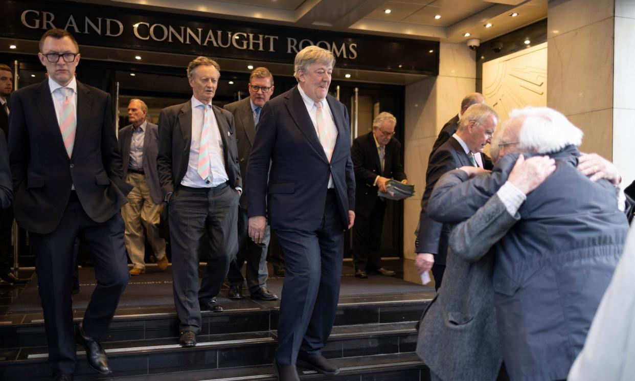<span>Garrick Club members, including Stephen Fry, leave the Grand Connaught Rooms after the vote on Tuesday.</span><span>Photograph: Graeme Robertson/The Guardian</span>