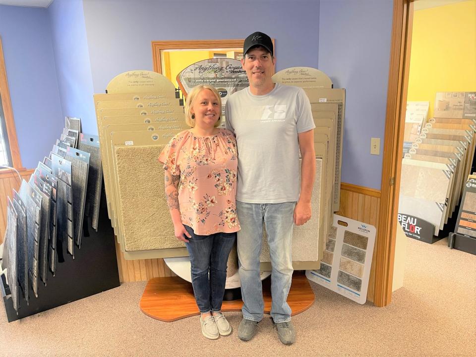 WW Flooring owners Nicole and Brian Walker are pictured among the flooring samples at their new business, located at 267 Plank Road in Somerset.