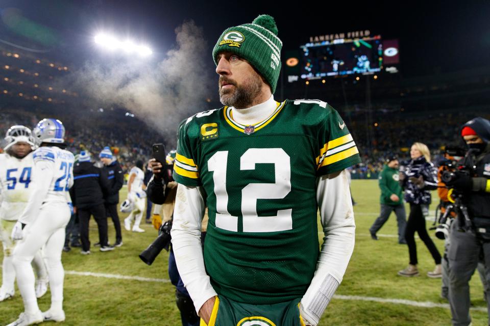 Aaron Rodgers on the field in January after his final game with the Green Bay Packers.