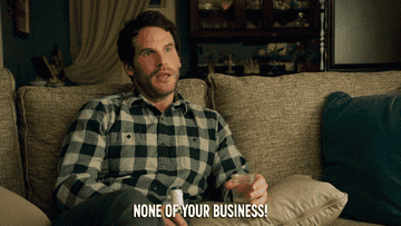 Person saying "None of your business!"