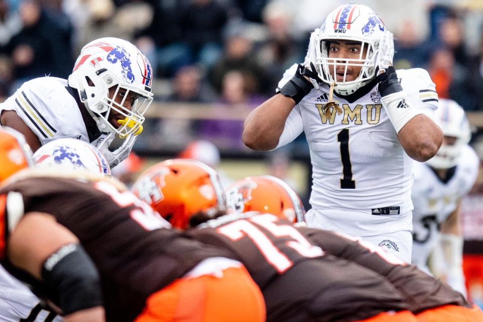 Western Michigan Broncos defensive end Ali Fayad (1) turns to the sidelines for the defensive play call against Bowling Green Falcons during the second quarter of an NCAA college football game in Kalamazoo, Mich., on Saturday, Oct. 26, 2019. (Joel Bissell/Kalamazoo Gazette via AP)