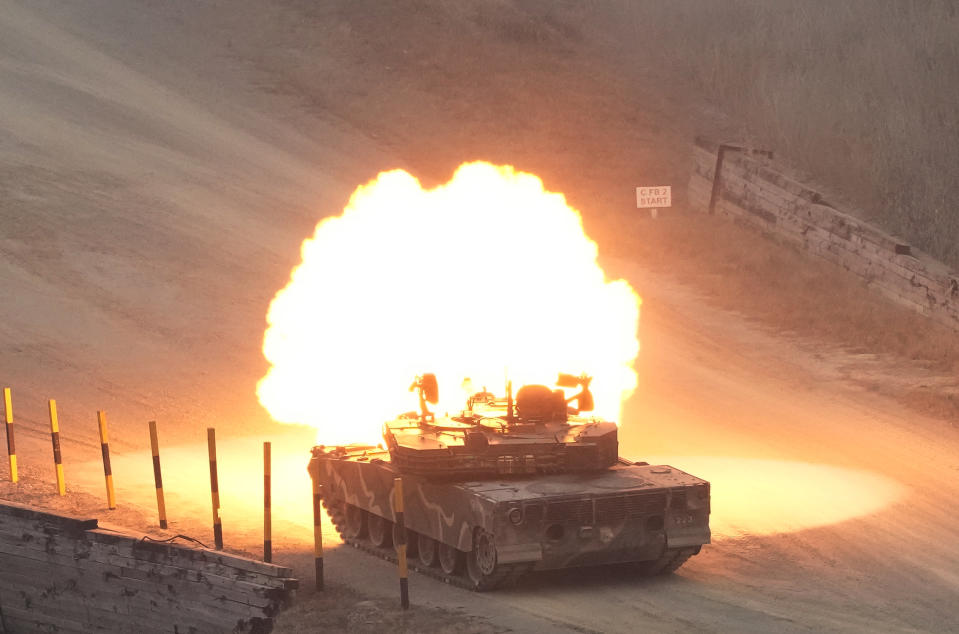 A South Korean army K1A1 tank fires during a combined live fire exercise between South Korea and the United States at Rodriguez Live Fire Complex in Pocheon, South Korea, Wednesday, March 22, 2023. North Korea launched multiple cruise missiles toward the sea on Wednesday, South Korea's military said, three days after the North carried out what it called a simulated nuclear attack on South Korea. (AP Photo/Ahn Young-joon)