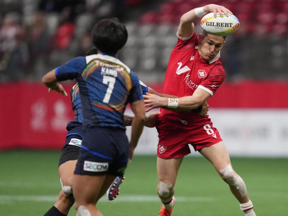 Canada's Cooper Coats competes against Japan in rugby 7's in Vancouver this April.  (Darryl Dyck/The Canadian Press - image credit)