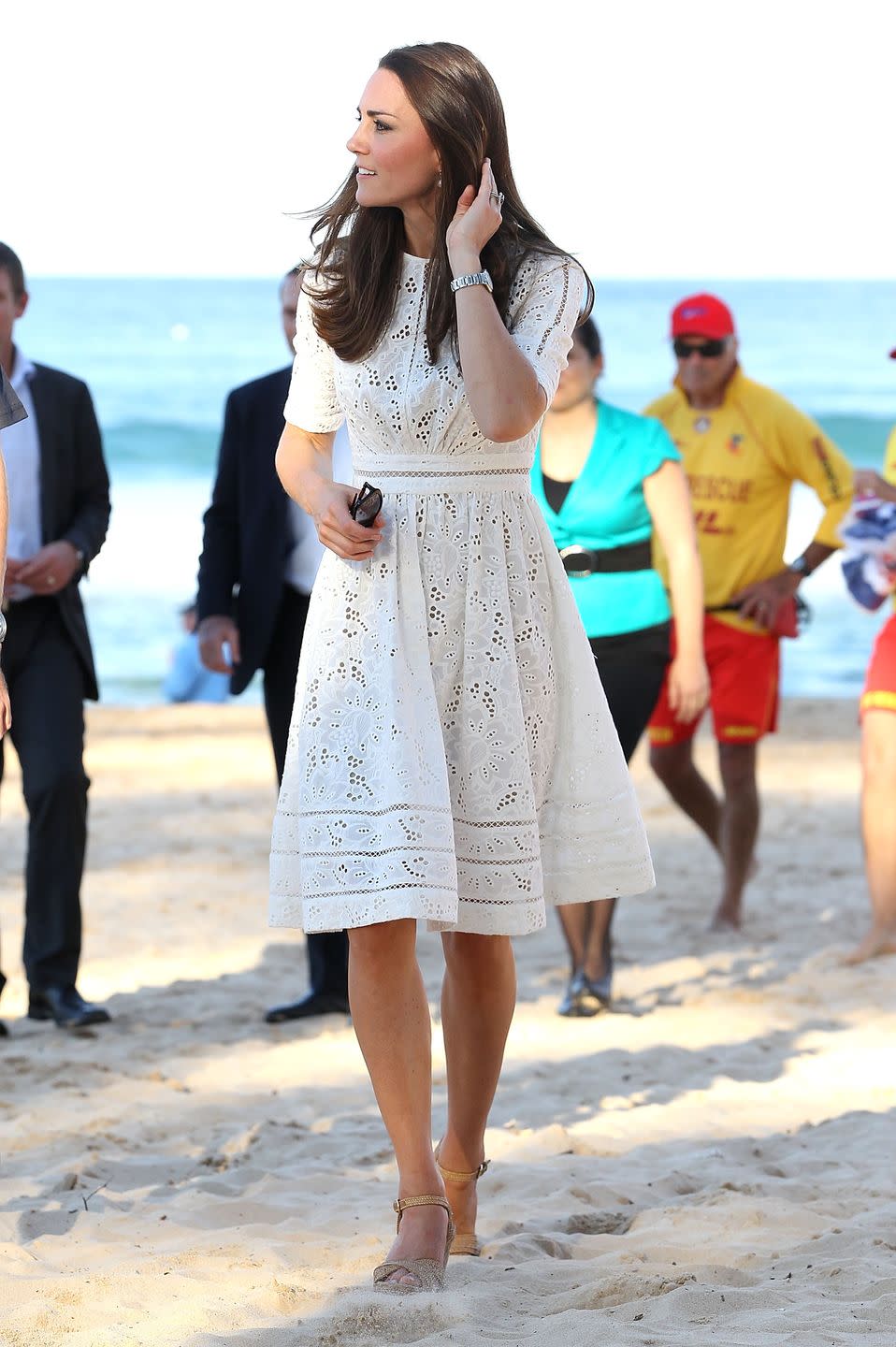 <p><em>April 18, 2014 —</em> During her and Prince William's tour of Australia, Kate wore a white eyelet dress by Australian designer Zimmermann with another pair of Stuart Weitzman wedges to an event at Manly Beach in Sydney.</p>