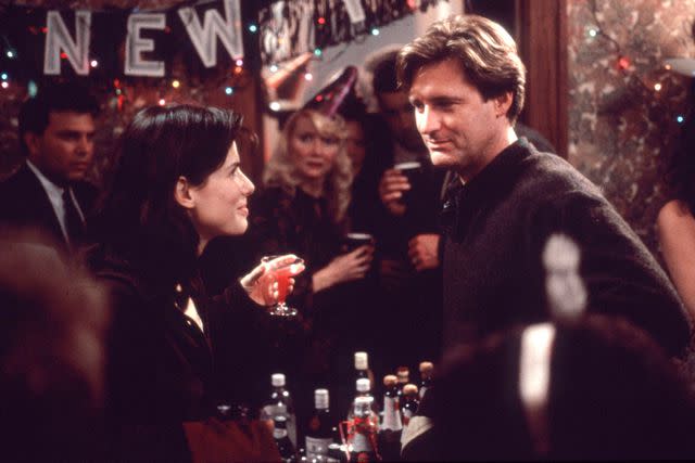 <p>Mary Evans/Ronald Grant/Everett</p> Sandra Bullock and Bill Pullman in 'While You Were Sleeping'