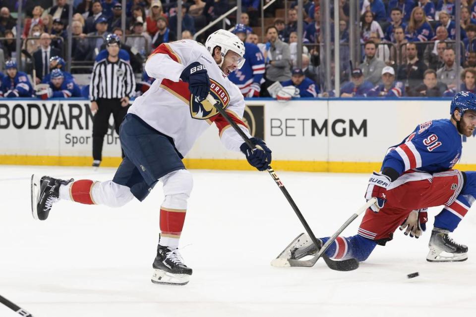 May 24, 2024; New York, New York, USA; Florida Panthers center Carter Verhaeghe (23) scores a goal as New York Rangers center Alex Wennberg (91) defends during the first period in game two of the Eastern Conference Final of the 2024 Stanley Cup Playoffs at Madison Square Garden.
