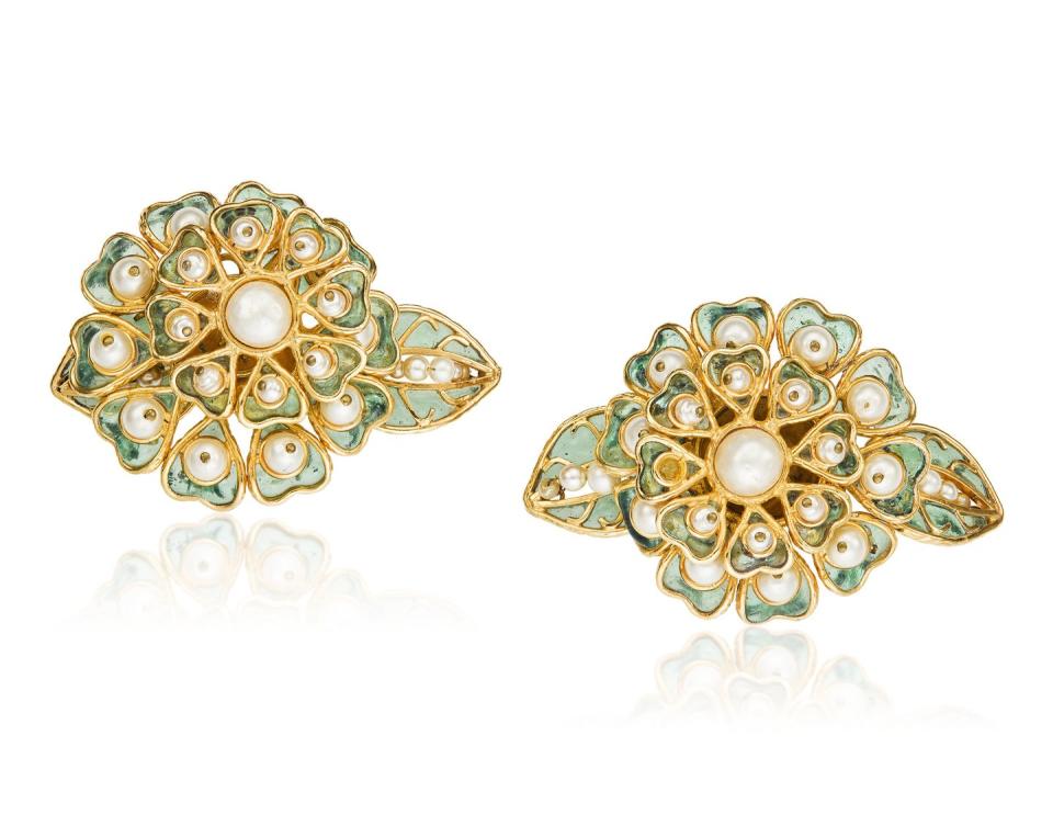 <p>Designed after one of our favorite blooms, these earrings are estimated to be worth $2,000 to $3,000.</p>