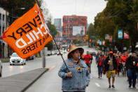 An "Every Child Matters" banner during a march on East Hastings Street towards Grandview Park, on Canada's first National Day for Truth and Reconciliation, honouring the lost children and survivors of Indigenous residential schools, their families and communities, in Vancouver, British Columbia, Canada September 30, 2021. REUTERS/Amy Romer