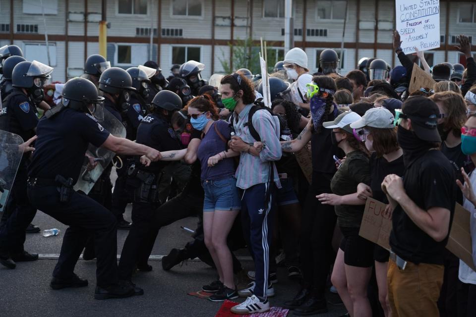 Detroit Police officers make arrests during the fifth day of protests against police brutality on Tuesday, June 2, 2020.