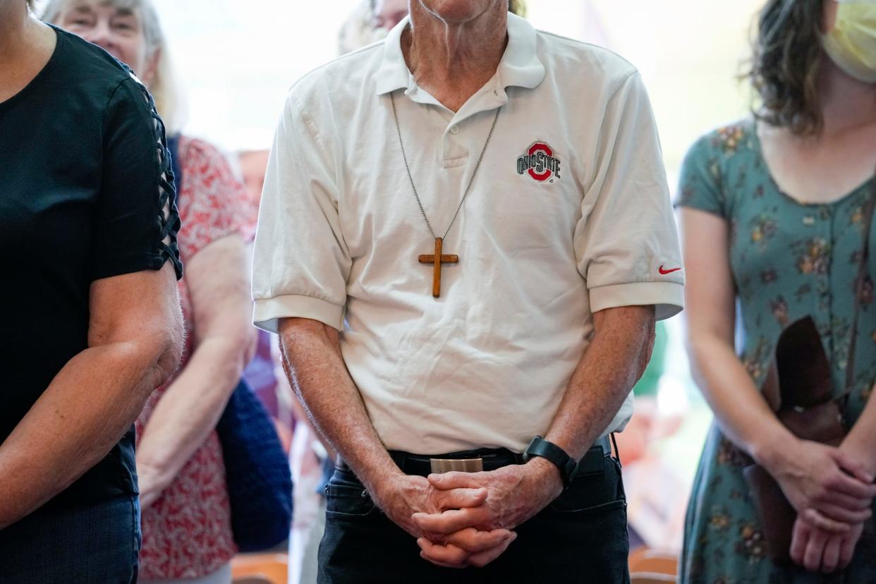 Jul 3, 2022; Columbus, Ohio, USA;  Bob Vieth, who began attending mass at the Newman Center when he was in graduate school at Ohio State in 1978, attends mass on July 3, 2022. The Catholic diocese is being taken from the Paulist fathers, an order of Catholic priests, who have run it for 65 years.  Mandatory Credit: Adam Cairns-The Columbus Dispatch