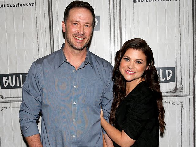 <p>Dominik Bindl/Getty</p> Brady Smith and Tiffani Thiessen at the Build Series to discuss Youre Missing It! in 2019.