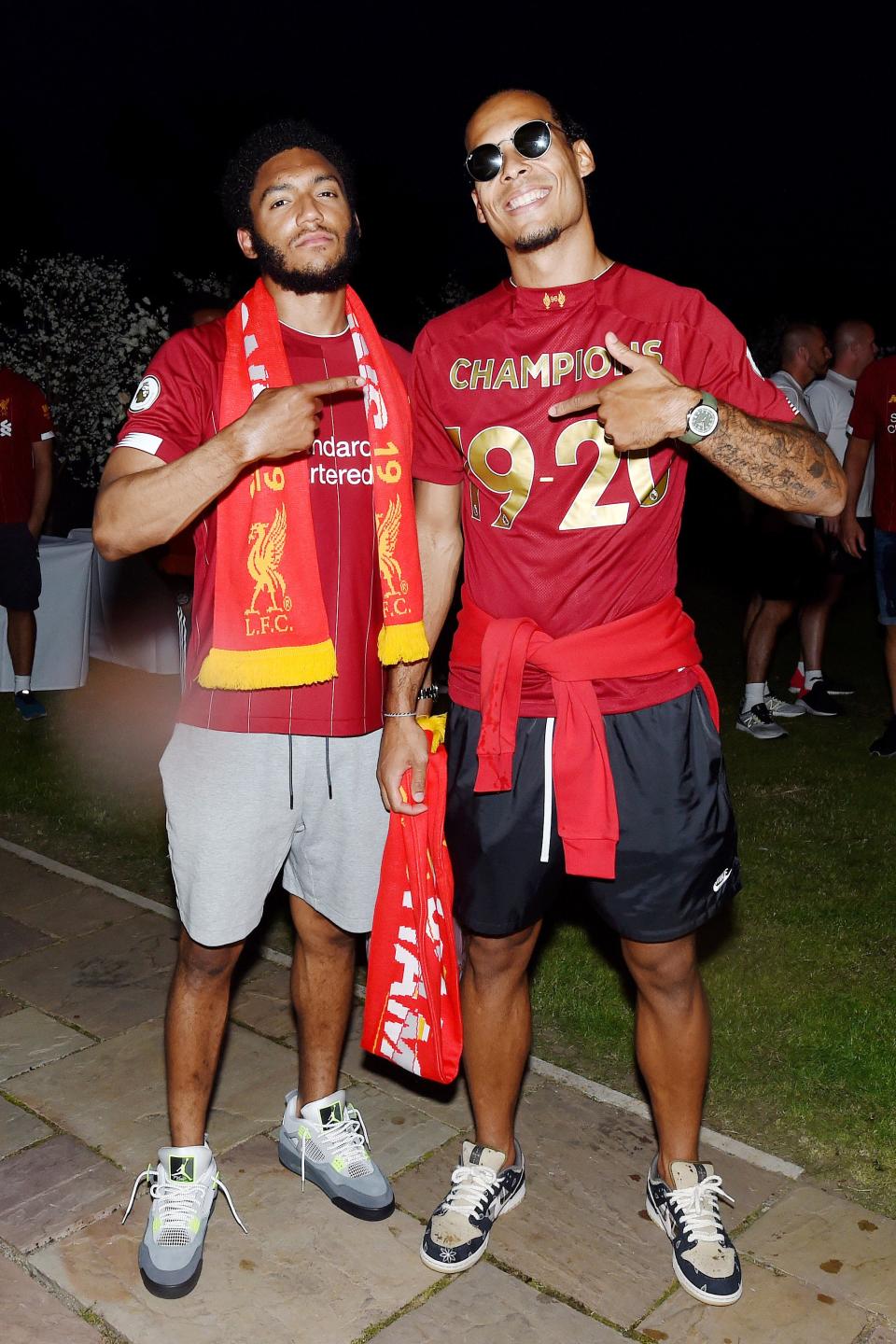 <h1 class="title">Liverpool Players Celebrate Winning the Premier League</h1><cite class="credit">Liverpool FC</cite>