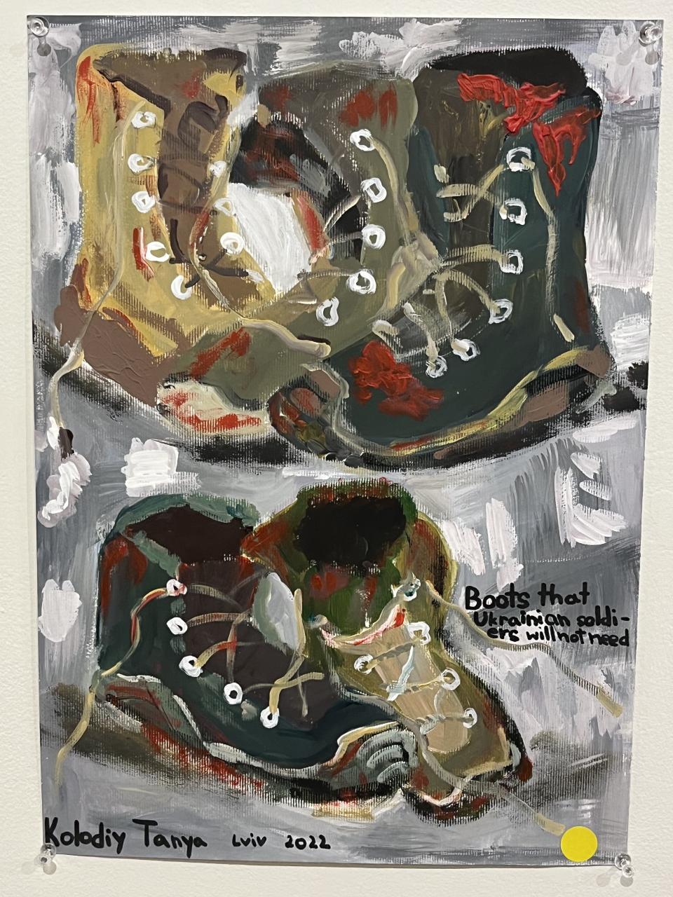An artwork by a Ukrainian child showing bloodied boots and the words, "Boots that Ukrainian soldiers will not need."