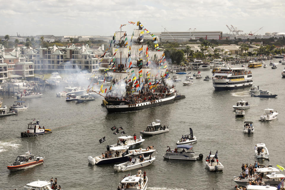 The Jose Gasparilla pirate ship carries members of Ye Mystic Krewe of Gasparilla en route to the Tampa Convention Center during the Gasparilla Invasion on Saturday, Jan. 27, 2024, in Tampa. (Louis Santana/Tampa Bay Times via AP)