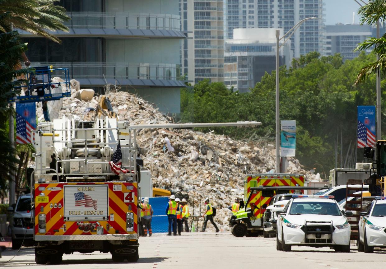 Workers search the site of the collapsed Champlain Towers South building in Surfside on July 11. MEGHAN McCARTHY/Palm Beach Daily News