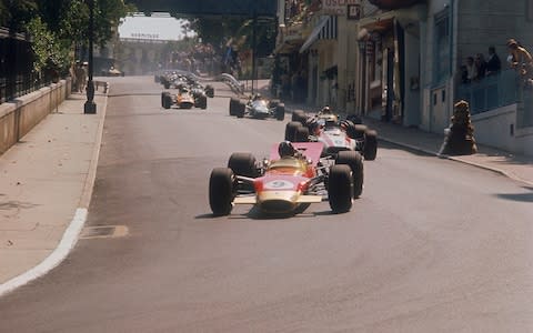 Graham Hill's Lotus leading John Surtees' Honda, Monaco Grand Prix, 1968 - Credit: HULTON ARCHIVE