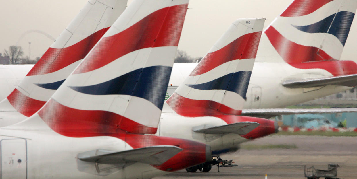 File photo dated 30/11/2006 of tail fins of British Airways' aircraft parked at Terminal One of London's Heathrow Airport. British Airways employees have overwhelmingly voted to approve a deal to furlough the airline's workers and preserve employment, a union has announced.