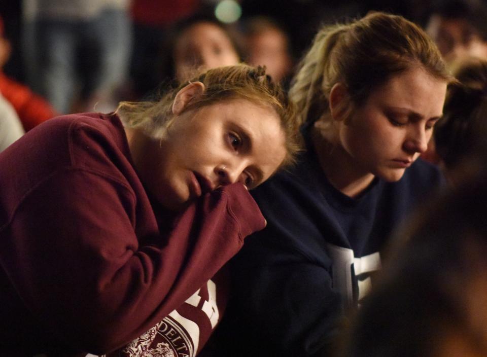 People attend a candlelight vigil at the University of Las Vegas student union.&nbsp;