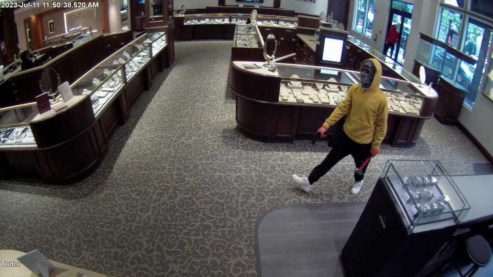 Suspects armed with guns and sledgehammers robbed Fink's Jewelers in Huntersville on July 11.