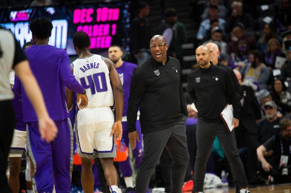 Mike Brown, Sacramento Kings head coach is all smiles after Sacramento Kings forward Harrison Barnes (40) scored a three point basket against the Chicago Bulls on Sunday during an NBA basketball game at Golden 1 Center in Sacramento. Hector Amezcua/hamezcua@sacbee.com