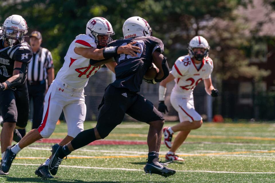 Bernards' David Brothers (left, No. 40)