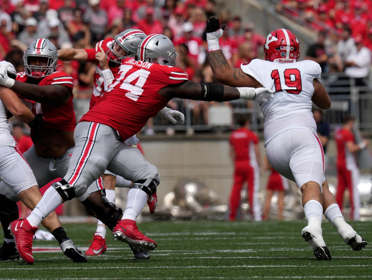 Sept. 9, 2023; Columbus, Oh., USA;  Youngstown State Penguins wide receiver Chase Glover-Rodgers (19) is purused by Ohio State Buckeyes offensive lineman Donovan Jackson (74) during the first half of Saturday's NCAA Division I football game at Ohio Stadium. 
