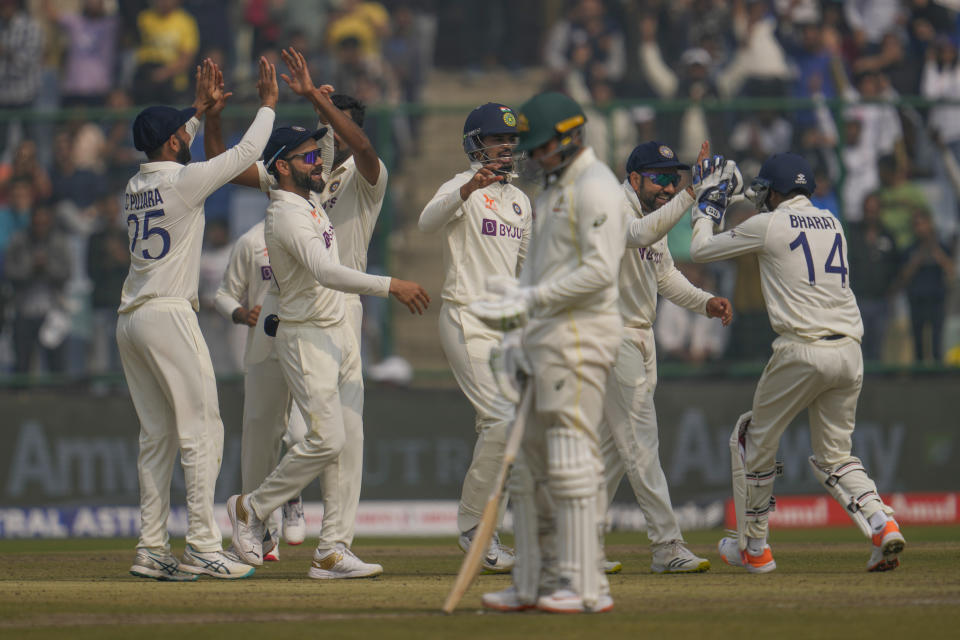 Indian team celebrates the dismissal of Australia's Marnus Labuschagne during the first day of the second cricket test match between India and Australia in New Delhi, India, Friday, Feb. 17, 2023. (AP Photo/Altaf Qadri)