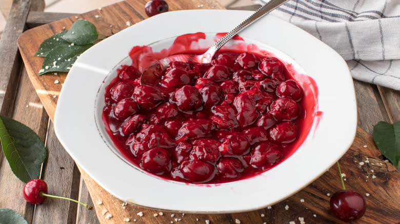 Cherry compote in white bowl