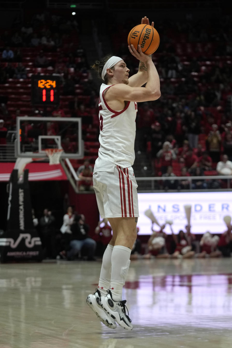Utah guard Gabe Madsen (55) looks to shoot against Washington State during the second half of an NCAA college basketball game Friday, Dec. 29, 2023, in Salt Lake City. (AP Photo/Rick Bowmer)