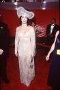 <p>In a sparkling nude gown and matching headpiece at the Oscars. </p>