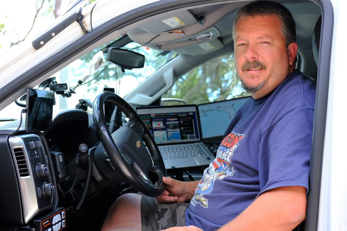 Mike Boylan of Mike’s Weather Page sits in his storm chasing truck on June 8, 2023. Boylan is prepping for tracking and chasing storms this hurricane season. Ryan Ballogg/rballogg@bradenton.com