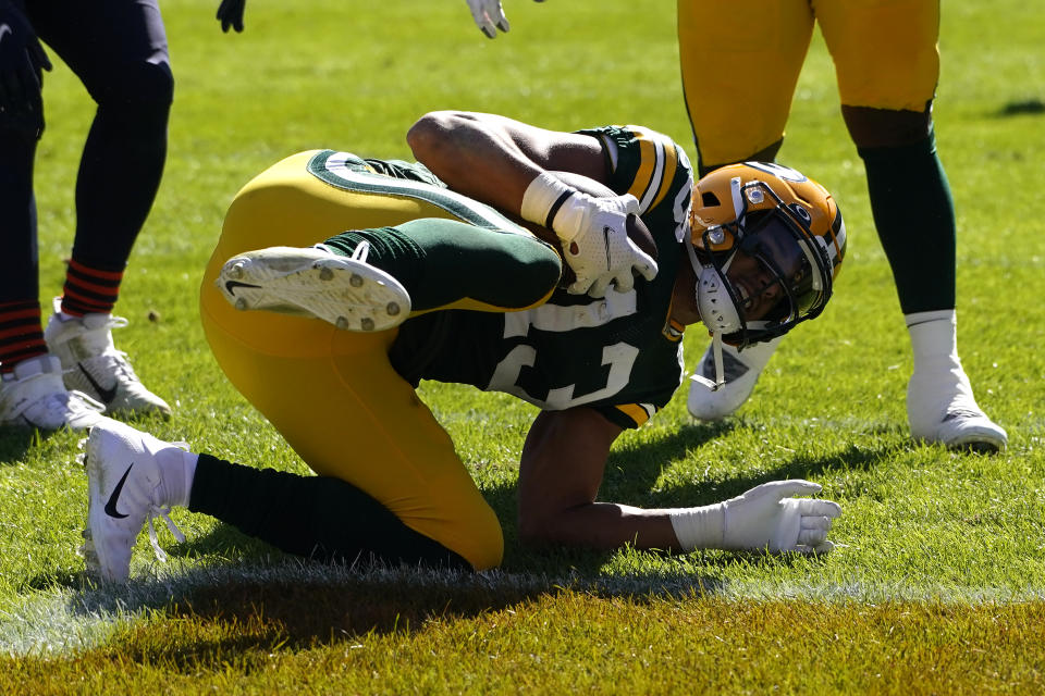 Green Bay Packers wide receiver Allen Lazard (13) scores during the first half of an NFL football game against the Chicago Bears Sunday, Oct. 17, 2021, in Chicago. (AP Photo/Nam Y. Huh)