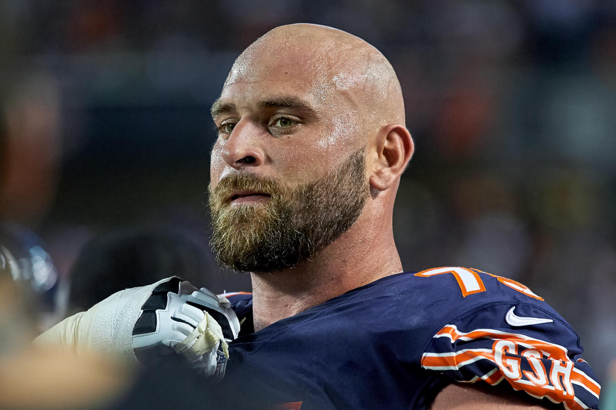 Brothers Chris and Kyle Long took playful shots at each other this week before their opening round playoff matchup in Chicago on Sunday. (Robin Alam/Getty Images)