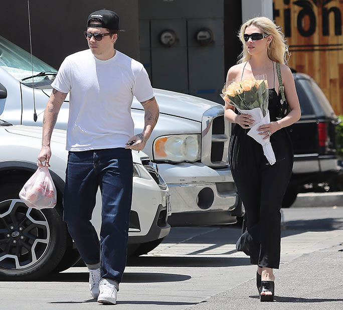 (L-R) Brooklyn Beckham and Nicola Petlz spotted at a Farmer’s Market in Los Angeles on May 29, 2022. - Credit: mcla@broadimage / MEGA