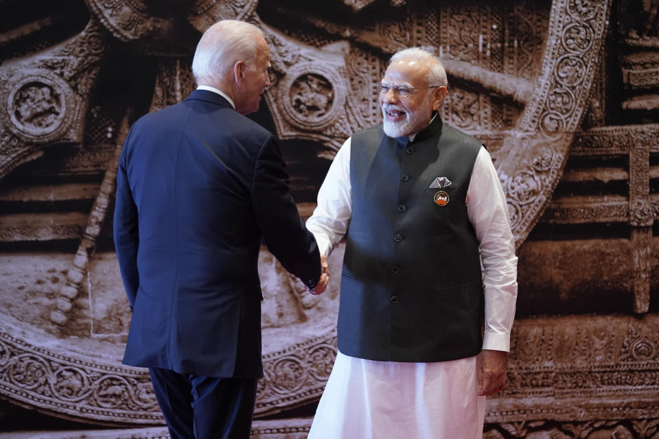 Indian Prime Minister Narendra Modi welcomes U.S. President Joe Biden upon his arrival at Bharat Mandapam convention center for the G20 Summit, in New Delhi, India, Saturday, Sept. 9, 2023. (AP Photo/Evan Vucci,Pool)