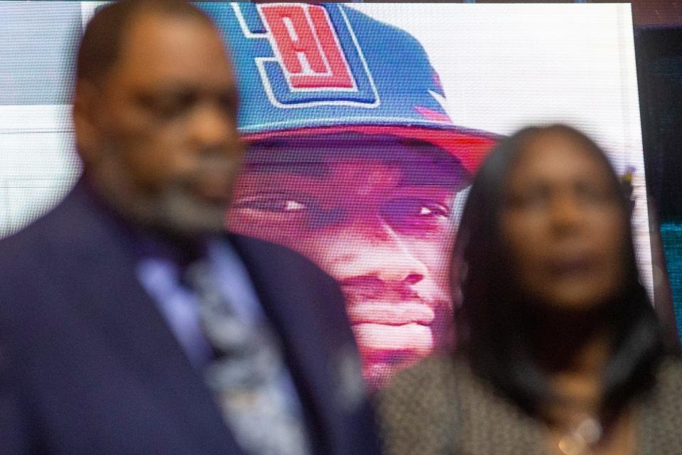 Rodney Wells and RowVaughn Wells, the parents of Tyre Nichols, listen as a photo of their son looks on behind them during a press conference held by civil rights attorney Ben Crump after the Department of Justice announced that an indictment is pending in federal court for the five now-former Memphis police officers involved in the Tyre Nichols case at Mississippi Boulevard Baptist Church in Memphis, Tenn., on Tuesday, September 12, 2023.