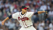 Atlanta Braves starting pitcher Charlie Morton throws in the first inning of a baseball against the New York Mets, Sunday, Oct. 2, 2022, in Atlanta. (AP Photo/Hakim Wright Sr.)