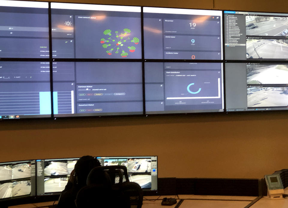 Image: An officer with the Jackson Police Department monitors live feeds from security cameras posted across the city at the city's new real time command center on Nov. 19, 2020. (Bracey Harris / NBC News)