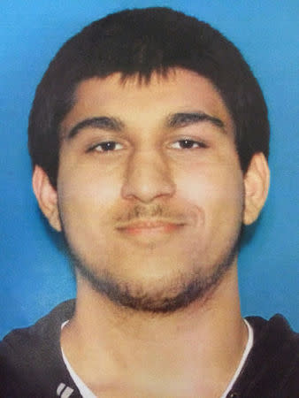 FILE PHOTO: Arcan Cetin, 20, of Oak Harbor is seen in a Washington State Department of Licensing photo released by the Washington State Patrol after they named him as a suspect in a mass shooting in Burlington, Washington, U.S. on September 24, 2016. Courtesy Washington State Patrol/Handout via Reuters/File Photo