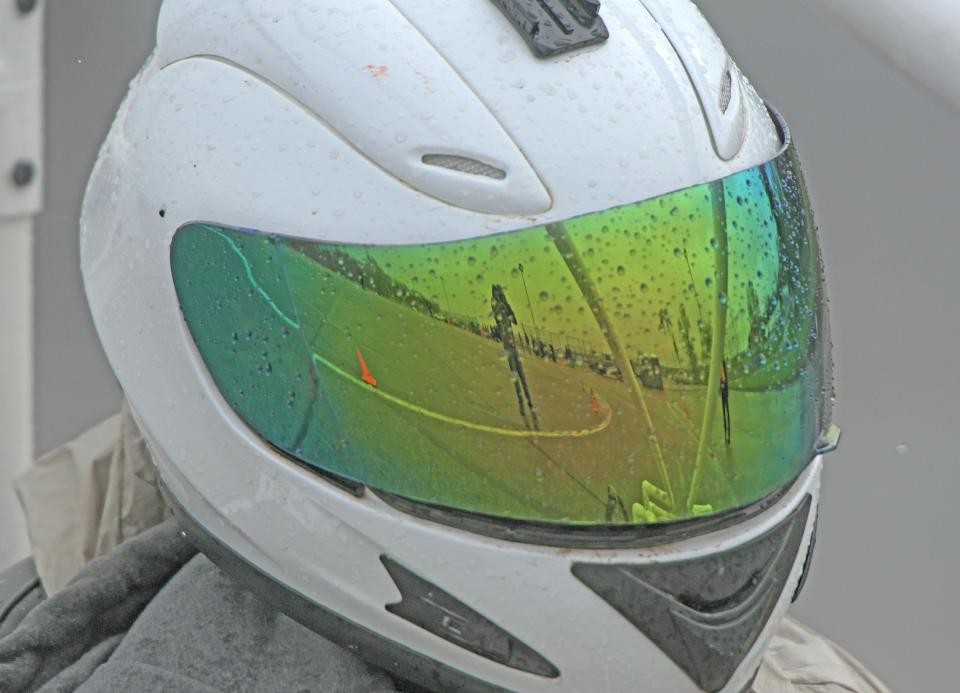 A driver weathers the rainy conditions Tuesday during the NCSC electric vehicle races at the Mid-Ohio Sports Car Course.