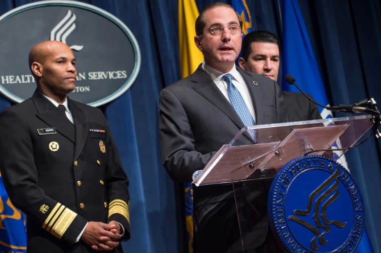 US Secretary of Health and Human Services, Alex Azar (center) described the surge in vaping among youth as an "unprecedented challenge"