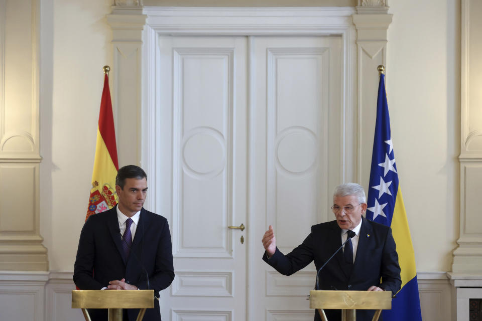 Member of the Bosnian presidency Sefik Dzaferovic, right, speaks during a press conference after official talks with the Spanish Prime Minister Pedro Sanchez in Sarajevo, Bosnia, Saturday, July 30, 2022. (AP Photo/Armin Durgut)