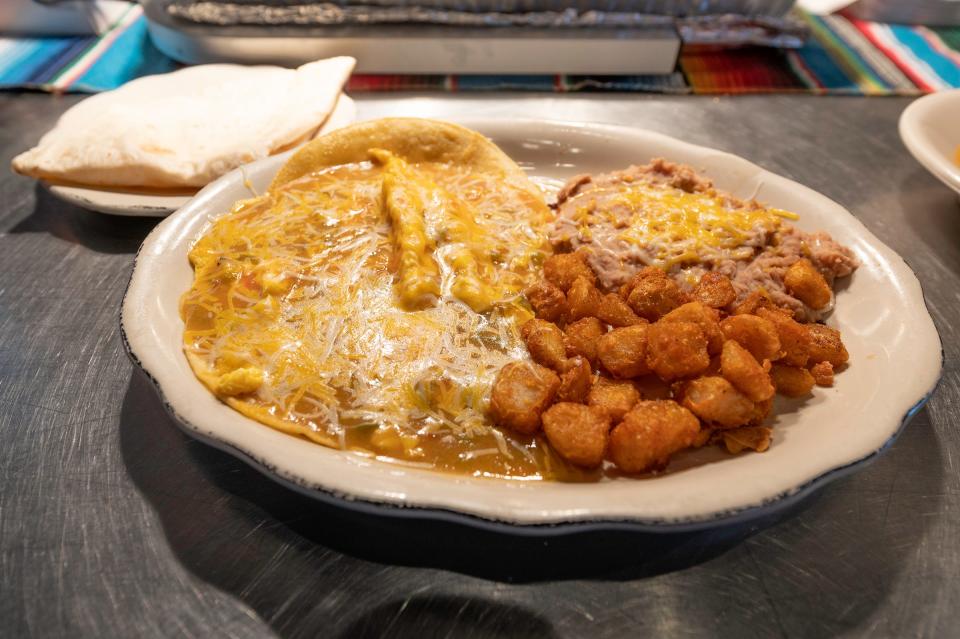 The huevos rancheros is a popular breakfast menu item at Garlic & Onions To Go located at 215 E. Abriendo Ave.
