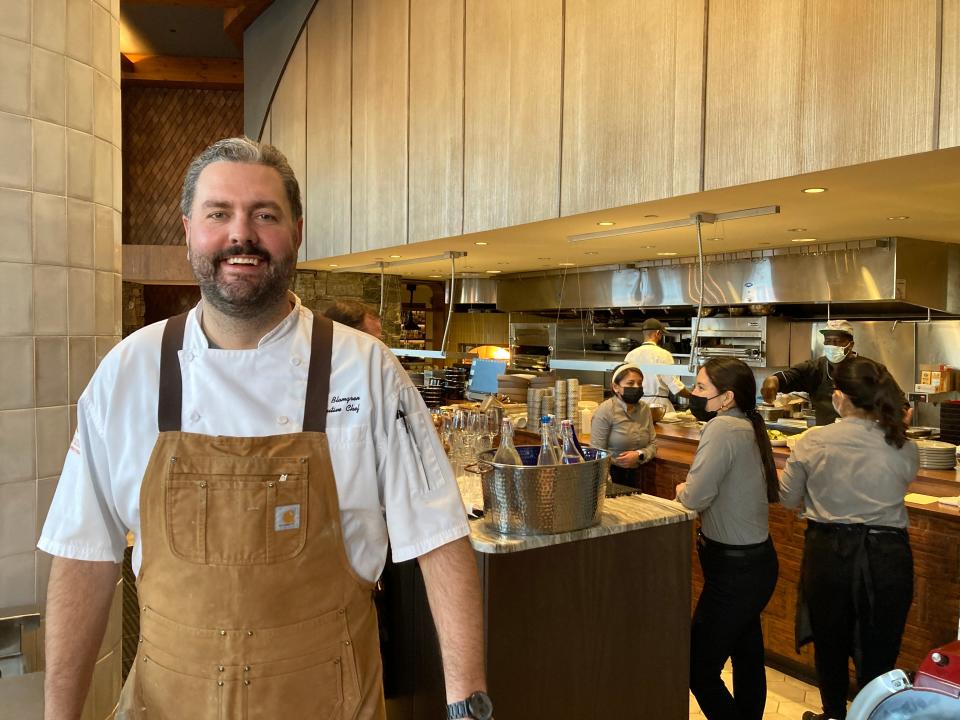 Sean Blomgren, executive chef at The Lodge at Spruce Peak in Stowe, stands Jan. 20, 2022 near the kitchen at Alpine Hall.