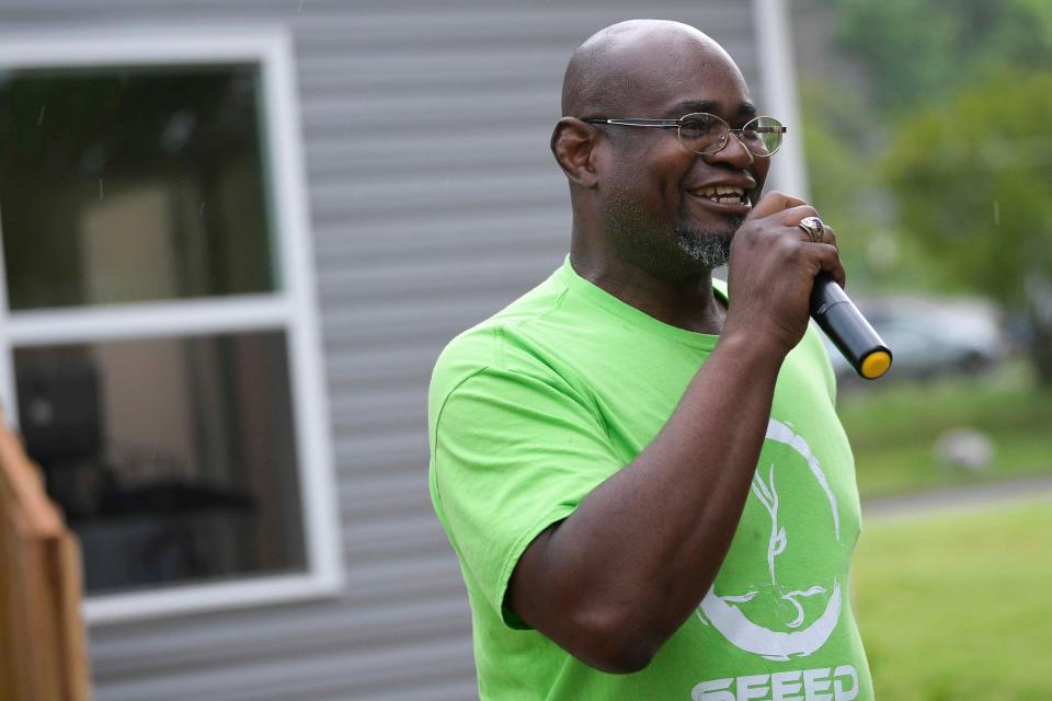 Stan Johnson, SEEED Executive Director and Founder, speaks during a ceremony of a SEEED solar home at 1122 Texas Ave. in Knoxville, Tenn. on Friday, May 6, 2022. The solar powered home features three bedrooms and energy efficient technology and amenities.