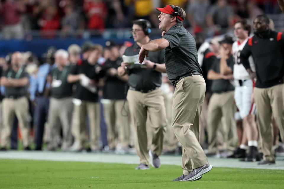 Georgia head coach Kirby Smart shouts during the first half of the Orange Bowl NCAA College Football Playoff semifinal game against Michigan, Friday, Dec. 31, 2021, in Miami Gardens, Fla. (AP Photo/Rebecca Blackwell)