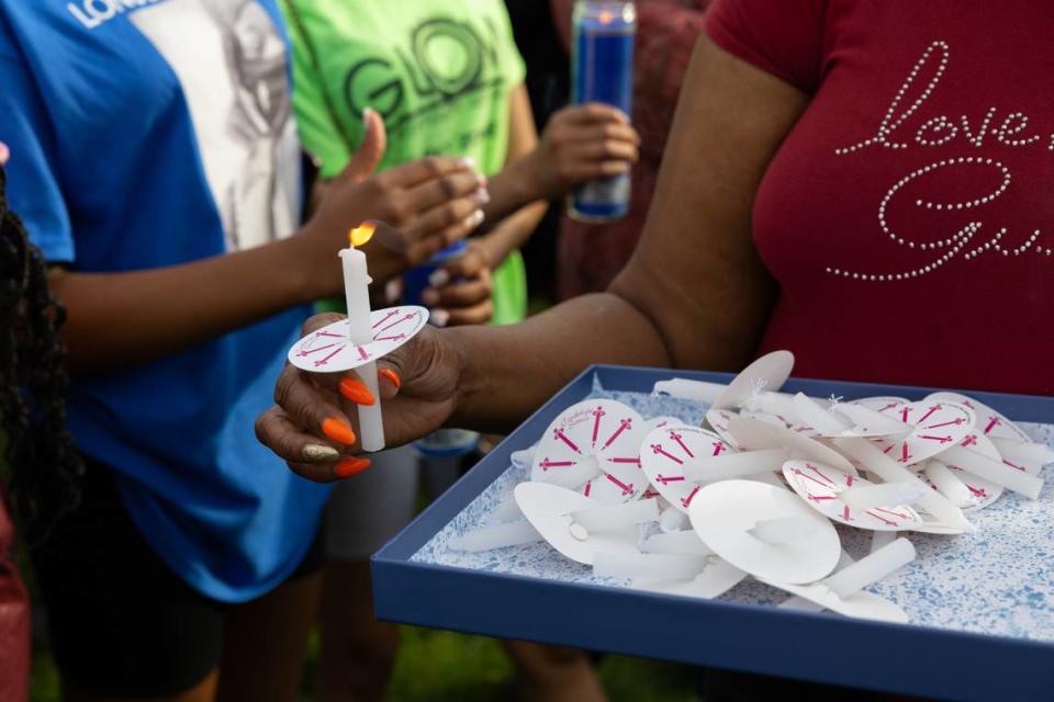 Friends and family of 13-year-old Jermel Ware, who died Sunday after go-cart accident, held a candlelight vigil for Jermel in Belleville’s Jaycee Park Friday night.