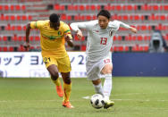 Soccer Football - International Friendly - Kirin Challenge Cup 2018 - Japan vs Mali - Stadium Maurice Dufrasne, Liege, Belgium - March 23, 2018 Japan’s Yu Kobayashi in action with Mali’s Hadi Sacko REUTERS/Eric Vidal